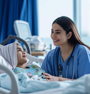 A nurse smiling with a young patient